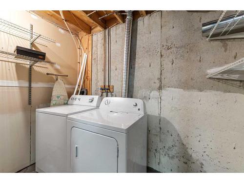 115 Deerview Court Se, Calgary, AB - Indoor Photo Showing Laundry Room