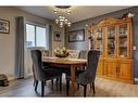 84 Riverside Way Se, Calgary, AB  - Indoor Photo Showing Dining Room 