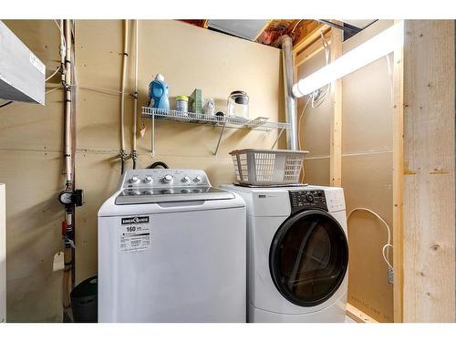 152 Cramond Green Se, Calgary, AB - Indoor Photo Showing Laundry Room