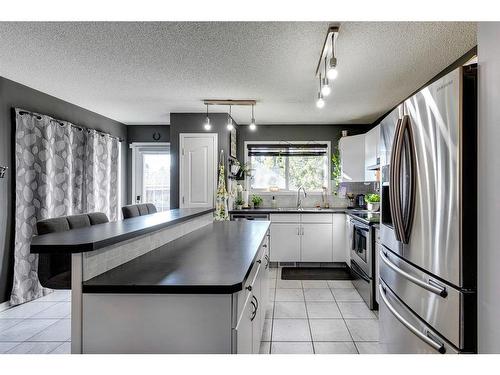 152 Cramond Green Se, Calgary, AB - Indoor Photo Showing Kitchen With Stainless Steel Kitchen