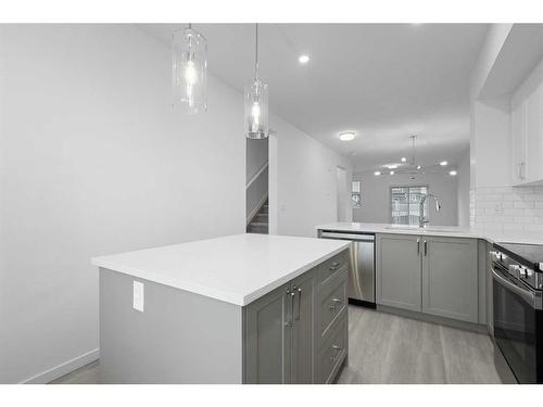 156 Copperleaf Way Se, Calgary, AB - Indoor Photo Showing Kitchen With Upgraded Kitchen