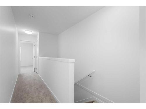 156 Copperleaf Way Se, Calgary, AB - Indoor Photo Showing Other Room