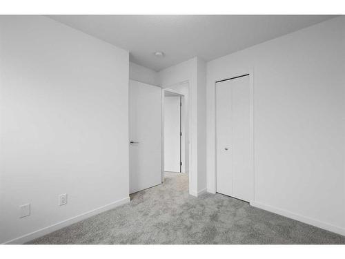 156 Copperleaf Way Se, Calgary, AB - Indoor Photo Showing Other Room