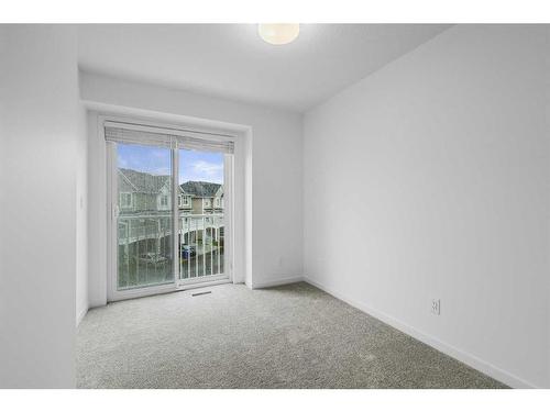 156 Copperleaf Way Se, Calgary, AB - Indoor Photo Showing Other Room