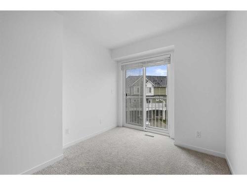 156 Copperleaf Way Se, Calgary, AB - Indoor Photo Showing Other Room