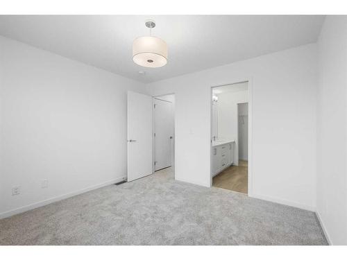 156 Copperleaf Way Se, Calgary, AB - Indoor Photo Showing Other Room