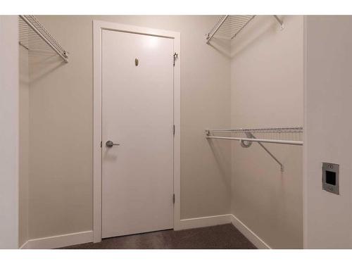 207-22 Auburn Bay Link Se, Calgary, AB - Indoor With Storage