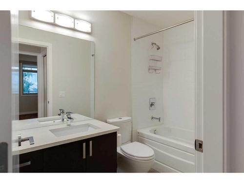 207-22 Auburn Bay Link Se, Calgary, AB - Indoor Photo Showing Bathroom