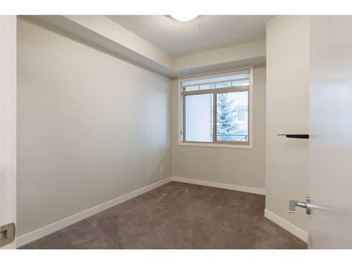 207-22 Auburn Bay Link Se, Calgary, AB - Indoor Photo Showing Other Room