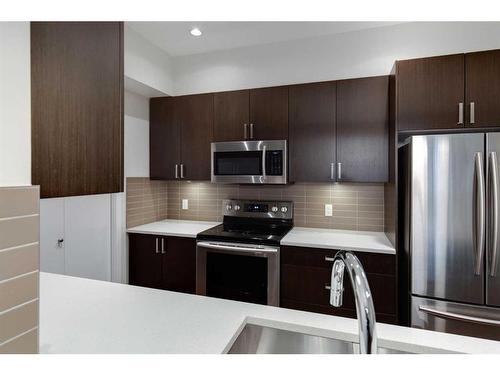 207-22 Auburn Bay Link Se, Calgary, AB - Indoor Photo Showing Kitchen