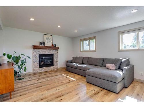 342 Oakwood Place Sw, Calgary, AB - Indoor Photo Showing Living Room With Fireplace