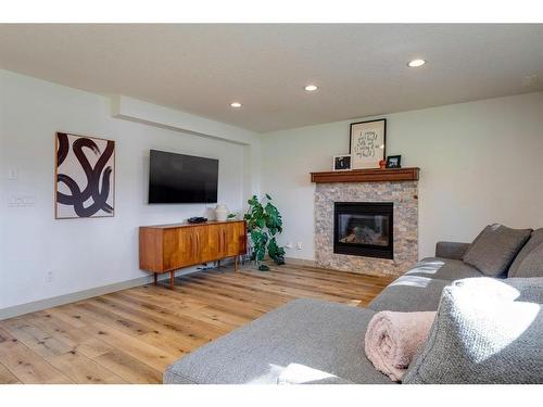 342 Oakwood Place Sw, Calgary, AB - Indoor Photo Showing Living Room With Fireplace