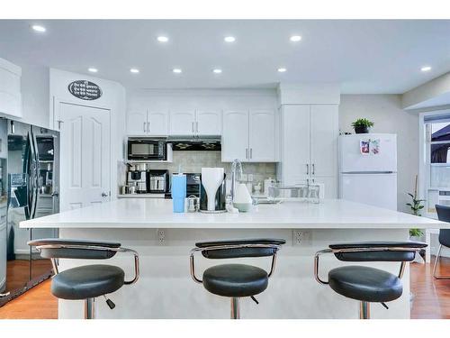 116 Saddlecrest Gardens Ne, Calgary, AB - Indoor Photo Showing Kitchen With Upgraded Kitchen