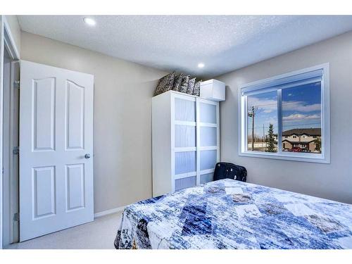 116 Saddlecrest Gardens Ne, Calgary, AB - Indoor Photo Showing Bedroom