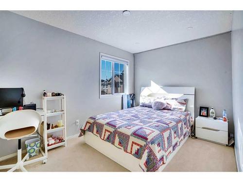 116 Saddlecrest Gardens Ne, Calgary, AB - Indoor Photo Showing Bedroom