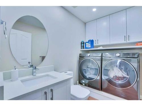 116 Saddlecrest Gardens Ne, Calgary, AB - Indoor Photo Showing Laundry Room