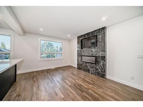 2126 18A Street Sw, Calgary, AB - Indoor Photo Showing Other Room With Fireplace