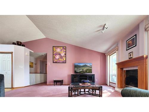 3021 214 Street, Bellevue, AB - Indoor Photo Showing Living Room With Fireplace