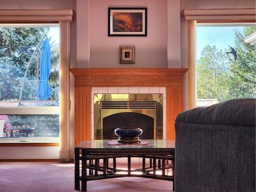 3021 214 Street, Bellevue, AB - Indoor Photo Showing Living Room With Fireplace