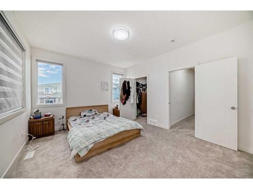 99 Saddlestone Drive Ne, Calgary, AB - Indoor Photo Showing Bedroom