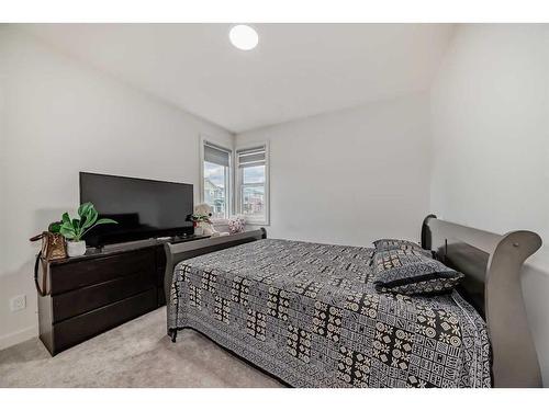 99 Saddlestone Drive Ne, Calgary, AB - Indoor Photo Showing Bedroom