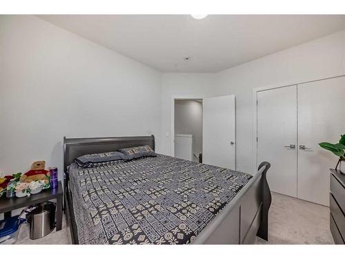 99 Saddlestone Drive Ne, Calgary, AB - Indoor Photo Showing Bedroom