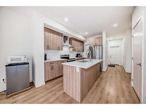 99 Saddlestone Drive Ne, Calgary, AB - Indoor Photo Showing Kitchen With Stainless Steel Kitchen