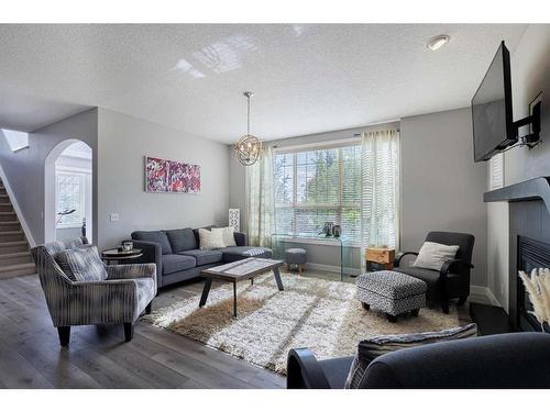 60 Tuscany Glen Park Nw, Calgary, AB - Indoor Photo Showing Living Room