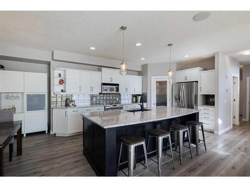 60 Tuscany Glen Park Nw, Calgary, AB - Indoor Photo Showing Kitchen With Stainless Steel Kitchen With Upgraded Kitchen