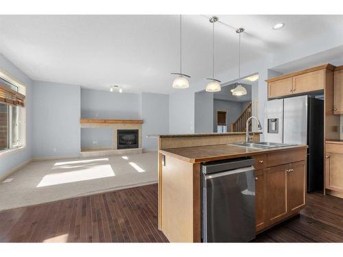 96 Royal Oak Manor Nw, Calgary, AB - Indoor Photo Showing Kitchen With Fireplace With Double Sink