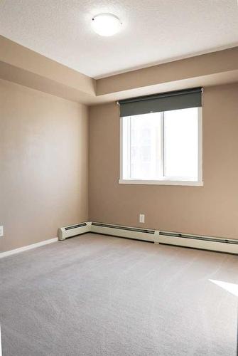 1301-4641 128 Avenue Ne, Calgary, AB - Indoor Photo Showing Other Room