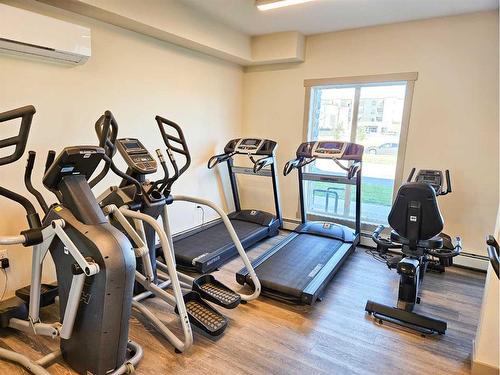 1301-4641 128 Avenue Ne, Calgary, AB - Indoor Photo Showing Gym Room