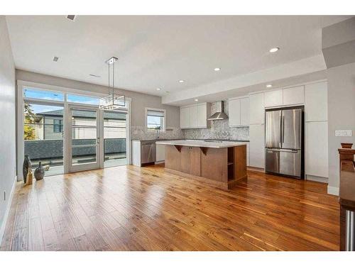 104-1804 34 Avenue Sw, Calgary, AB - Indoor Photo Showing Kitchen With Stainless Steel Kitchen With Upgraded Kitchen