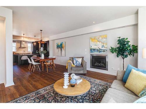 3-1820 34 Avenue Sw, Calgary, AB - Indoor Photo Showing Living Room With Fireplace