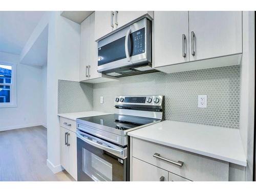 502-33 Merganser Drive West, Chestermere, AB - Indoor Photo Showing Kitchen