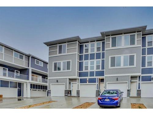 502-33 Merganser Drive West, Chestermere, AB - Outdoor With Facade