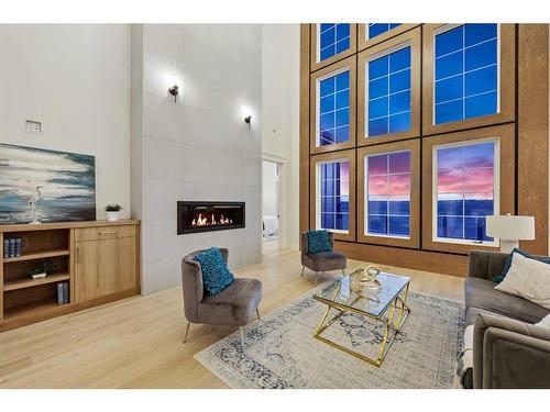 183 Springbank Heights Place, Rural Rocky View County, AB - Indoor Photo Showing Living Room With Fireplace