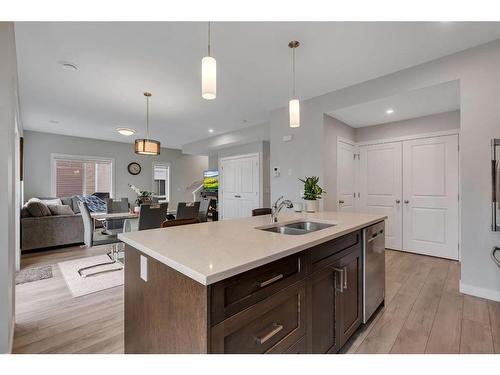 274 Canals Crossing Sw, Airdrie, AB - Indoor Photo Showing Kitchen With Double Sink