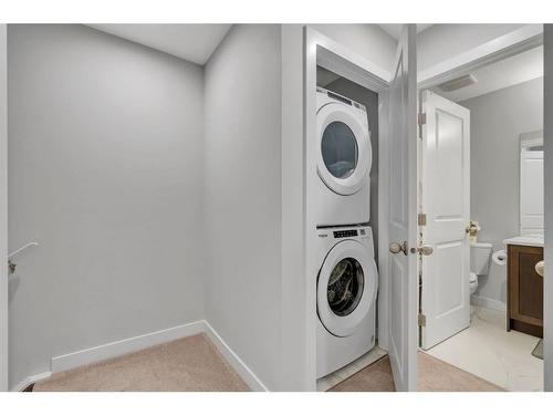 274 Canals Crossing Sw, Airdrie, AB - Indoor Photo Showing Laundry Room