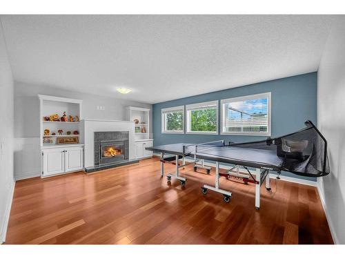 2435 Morris Crescent Se, Airdrie, AB - Indoor Photo Showing Living Room With Fireplace