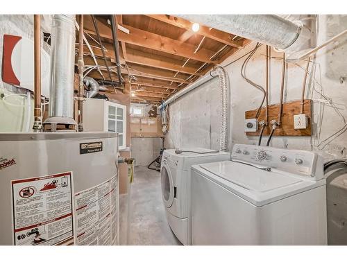 21 Rundlelawn Court Ne, Calgary, AB - Indoor Photo Showing Laundry Room