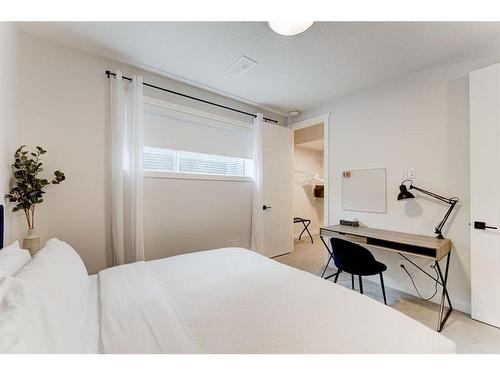 #1-632 56 Ave Sw, Calgary, AB - Indoor Photo Showing Bedroom