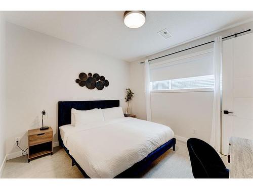 #1-632 56 Ave Sw, Calgary, AB - Indoor Photo Showing Bedroom