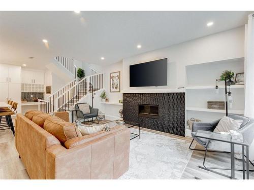 #1-632 56 Ave Sw, Calgary, AB - Indoor With Fireplace