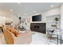 #1-632 56 Ave Sw, Calgary, AB  - Indoor With Fireplace 