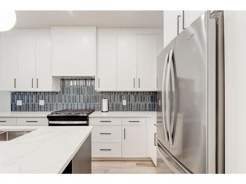 #1-632 56 Ave Sw, Calgary, AB - Indoor Photo Showing Kitchen With Stainless Steel Kitchen With Upgraded Kitchen