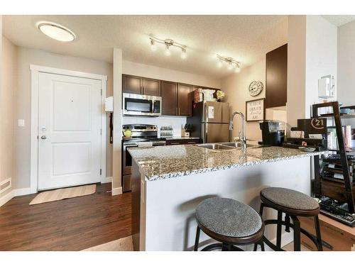 413-10 Kincora Glen Park Nw, Calgary, AB - Indoor Photo Showing Kitchen With Double Sink