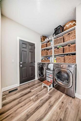 136 Saddlecrest Green Ne, Calgary, AB - Indoor Photo Showing Laundry Room