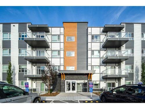 222-360 Harvest Hills Way Ne, Calgary, AB - Outdoor With Balcony With Facade