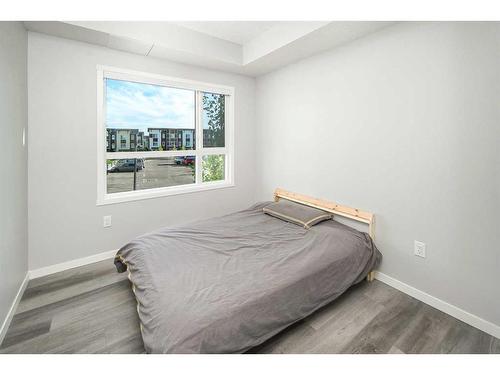 222-360 Harvest Hills Way Ne, Calgary, AB - Indoor Photo Showing Bedroom